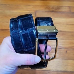 Leather belt with brass buckle